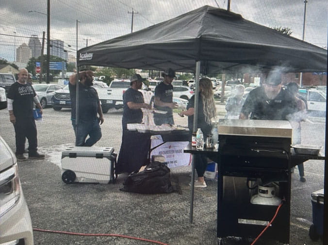 BBQ event in the Moore Supply Frio parking lot